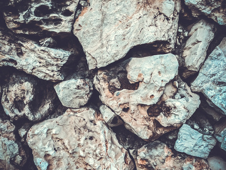 Close up of natural stone wall. Stone wall texture.の写真素材