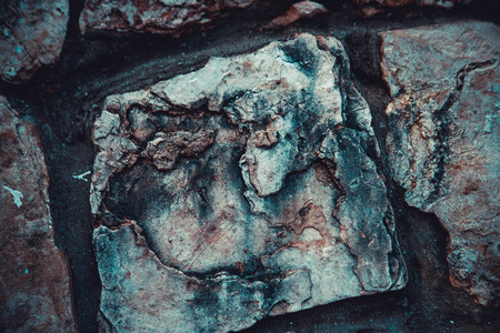 Close up of natural stone wall. Stone wall texture.の写真素材
