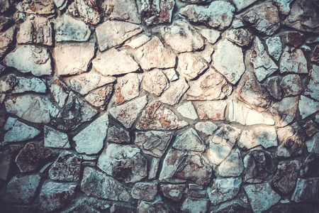 Close up of natural stone wall. Stone wall texture.の写真素材