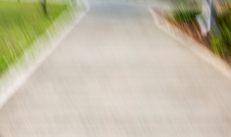 Abstract motion blur effect. Asphalt texture on road.の写真素材