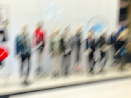 Abstract motion blur effect. Shopping mall as background, bokeh.
