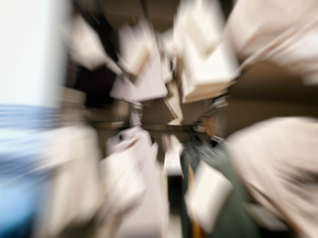 Abstract motion blur effect. Shopping mall as background, bokeh.