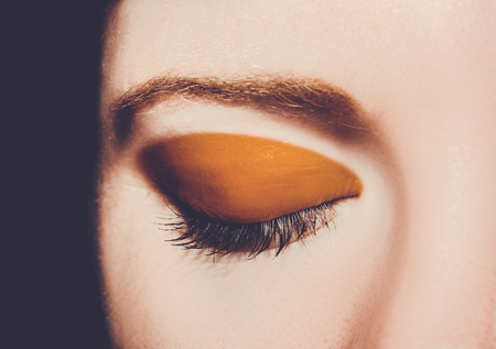 a closed eye of a young womanの写真素材