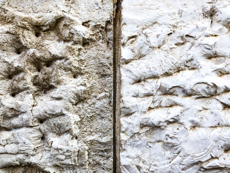 Close up of natural stone wall. Stone wall texture.の写真素材