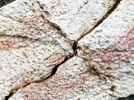 Close up of natural stone wall. Stone wall texture.の写真素材