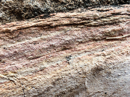 Close up of natural stone wall. Stone wall texture.の写真素材