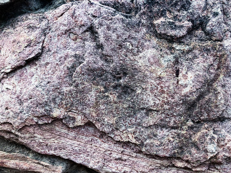 Close up of natural stone wall. Stone wall texture
