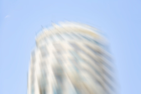 City on a sunny day. Abstract motion blur effect.の写真素材