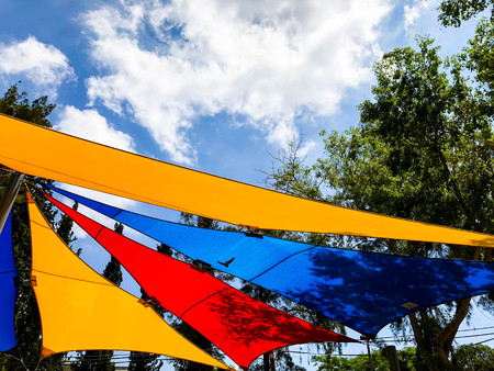 Awning in the midday sun against the skyの写真素材