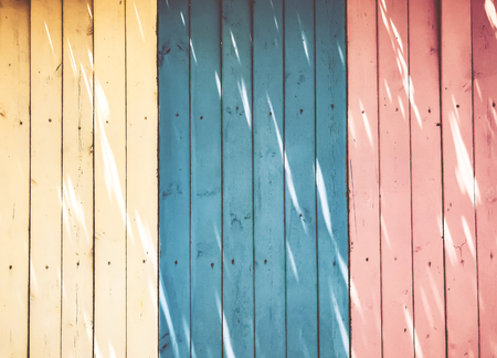 Colored texture of wooden dry fence boards.の写真素材