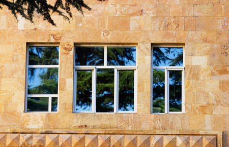 Old Tbilisi architecture, window and exterior decor in summer day.