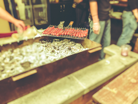 Grilled Sausages. Sausages preparing on a barbecue grill over charcoal. Popular food in Goergia.の写真素材