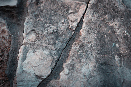 Close up of natural stone wall. Stone wall texture.