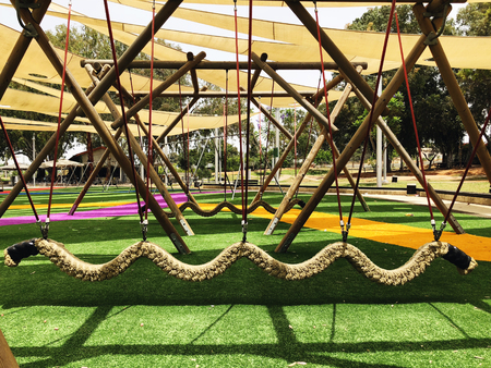 Park with set of modern kids playground background in Gan Be Ivrit, Rishon Le Zion.の写真素材