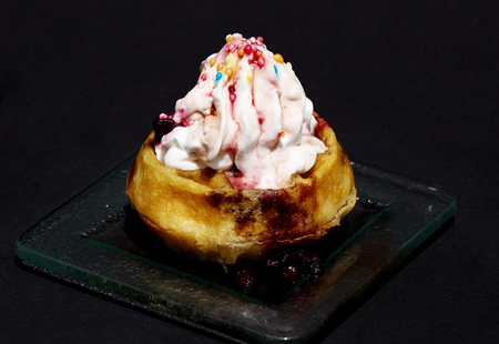 Sweet small cake with cream close up shot.の写真素材