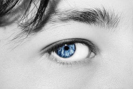 A beautiful insightful look man's eye. Close up shotの写真素材