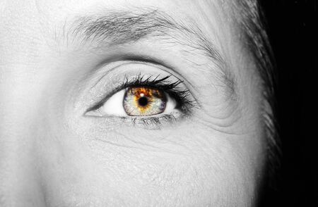 A beautiful insightful look woman's eye. Close up shotの写真素材