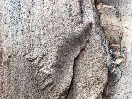 Close up of natural stone wall. Stone wall texture.の写真素材