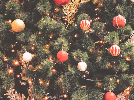 Christmas toys on the tree. Decorated Christmas tree. Christmas mood.の写真素材