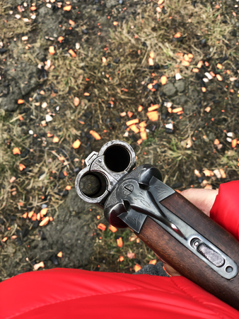 Male hunter ready to hunt with hunting rifle.