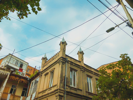 Beautiful old houses on narrow street of the old city of Tbilisi, Georgia.の写真素材