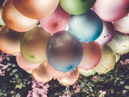 Air balloons background, big bunch of helium balloons, happy birthday, surprise for holiday, decoration. Festive background .の写真素材
