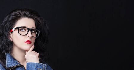 Image of a beautiful young woman wearing glasses.の写真素材