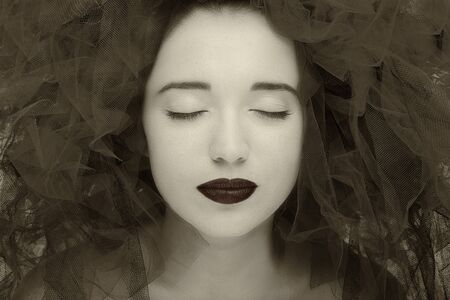 Beautiful young model. Gorgeous Woman Face in black and white effect.の写真素材