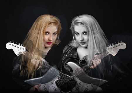 Beautiful blonde girl in rock style on a black background
