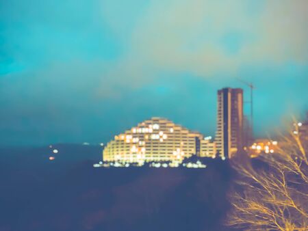 Night view opening on new buildings on the background of the night sky. Blure effect.の写真素材