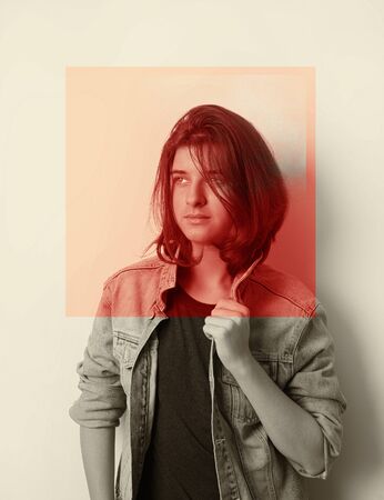 Portrait of a teenager wearing a blue jacket in studio