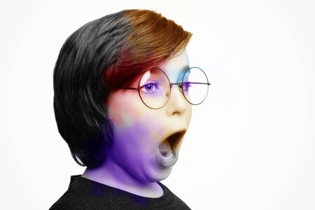 Handsome boy wearing glasses over white background