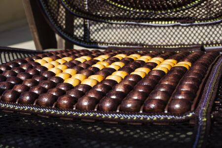 Wooden beads front car seat cover and chairの写真素材
