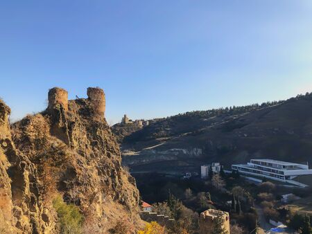 Beautiful view of the old fortress overlooking the botanical garden. Old Tbilisi, winter in the...
