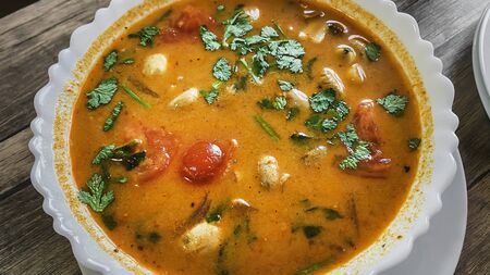 The portion of Tom Yum - famous Thai soup.