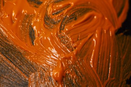 Abstract painted background. Background was painted on black paperの写真素材