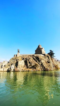 Architecture of Old Tbilisi. Kura river. View from the river bank.