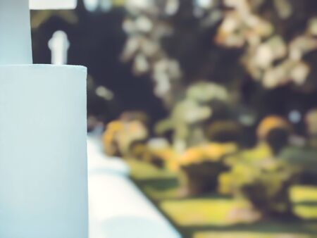 Beautiful landscape with trees in a city park, a warm autumn day in the city. Blur effect.の写真素材