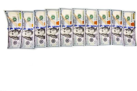 A pile of  US banknotes with president portraits. Cash of  dollar bills, dollar background image.
