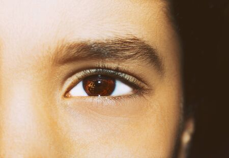 Image of child dark eye close up.の写真素材