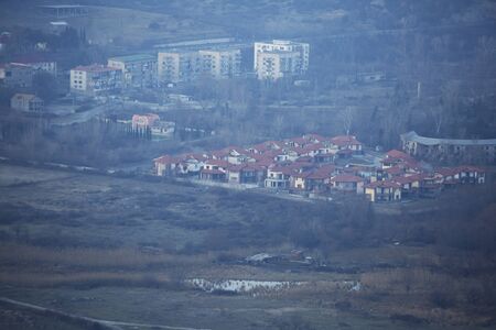 Newly built buildings in Mtskheta. A distant view.