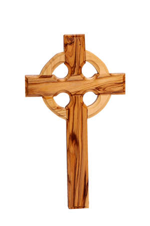 Wooden crucifix standing on white backgroundの写真素材