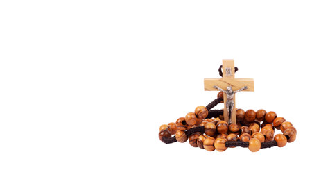 Traditional Christian holy religious wooden rosary isolated on white backgroundの写真素材