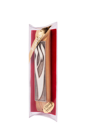 A Jewish Wooden Mezuzah contains specific Torah verses and is placed on the doorframe of homes.の写真素材