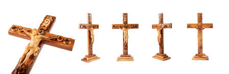 Set of Wooden crucifix standing on white background.