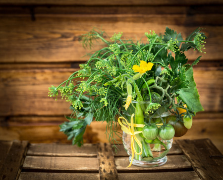 Garden Vegetables for table decoration on old wooden background with copy spaceの写真素材