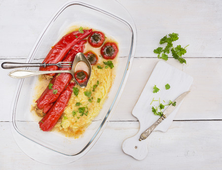 baked red paprika peppers with mashed potatoesの写真素材