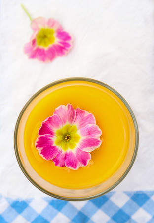 yellow juice in glassの写真素材