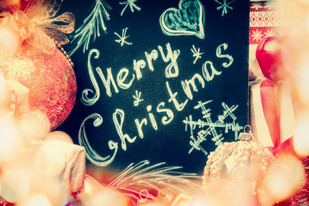 Merry Christmas greeting gard with festive bokeh lightingの写真素材