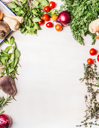 Fresh organic vegetables food background on white wooden , top view, frameの写真素材